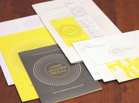 The entire event package with Save-the-Date card, invitation, RSVP card, program, coat check tag and bookmark.